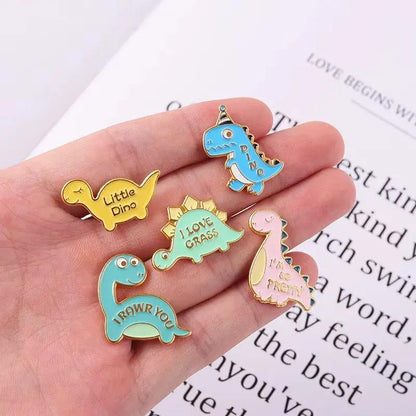 Dinosaur Series Enamel Pins Book Skate Rock LGBT Animal Brooches Lapel Badges Funny Cartoon Jewelry Gifts for Children Wholesale
